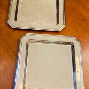 Modern pair of high polish stainless steel service trays, ridged,angled corners